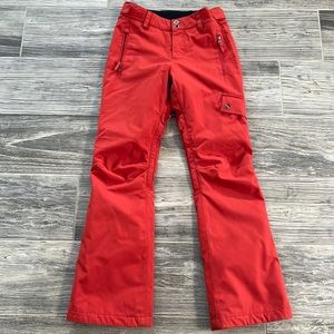 Women’s extra small billabong red orange ski pants with Velcro adjustable waist.